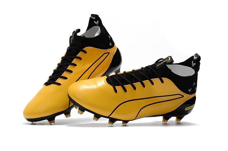 PUMA evoTOUCH Pro FG Soccer Cleats Yellow Gold Black